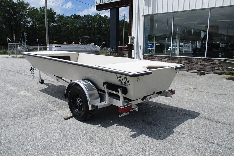 Slide: The Image of 2027 Delta Boatworks DELTA D1550 on trailer, parked outside showroom. - 2