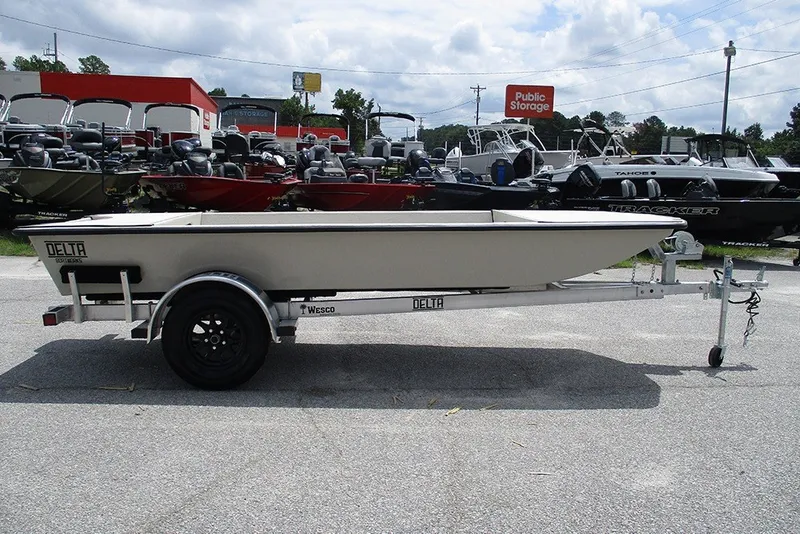 Slide: The Image of 2027 Delta Boatworks DELTA D1550 on trailer, parked outdoors at a dealership. - 6