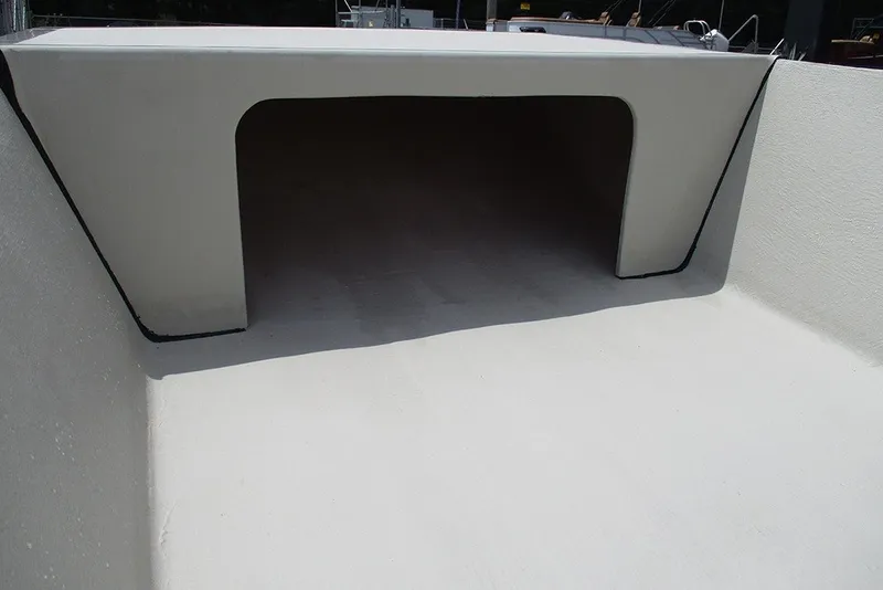 Slide: The Image of 2027 Delta Boatworks DELTA D1550 deck with storage compartment, sleek design. - 9
