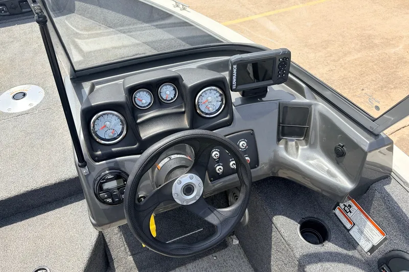Slide: The Image of 2020 Tracker Pro Guide V-165 WT boat dashboard with gauges and navigation system. - 26