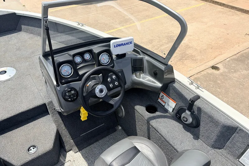 Slide: The Image of 2020 Tracker Pro Guide V-165 WT boat dashboard with steering wheel and Lowrance device. - 25