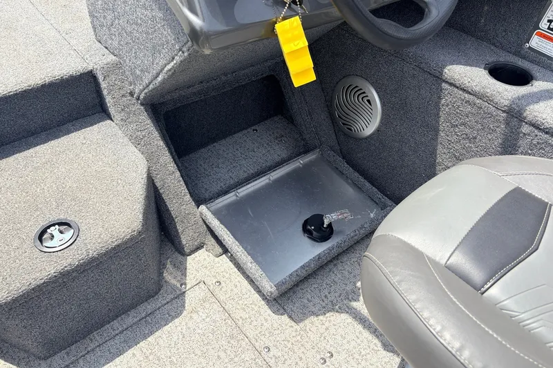 Slide: The Image of Interior of 2020 Tracker Pro Guide V-165 WT boat showing seating and storage area. - 28