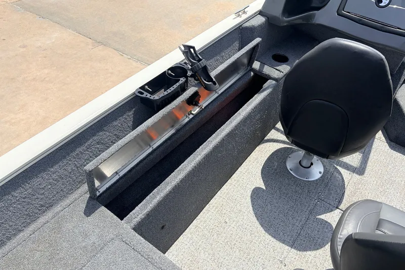 Slide: The Image of 2020 Tracker Pro Guide V-165 WT boat interior with seating and storage compartments. - 22