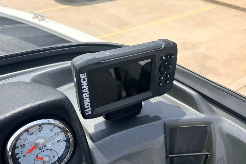 Slide: The Image of Lowrance fish finder on 2020 Tracker Pro Guide V-165 WT dashboard, next to speedometer. - 27