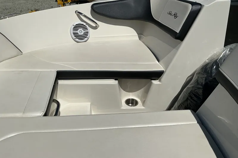 The Image of 2018 Sea Ray SPX 210 boat interior with seating and speaker detail. - 1