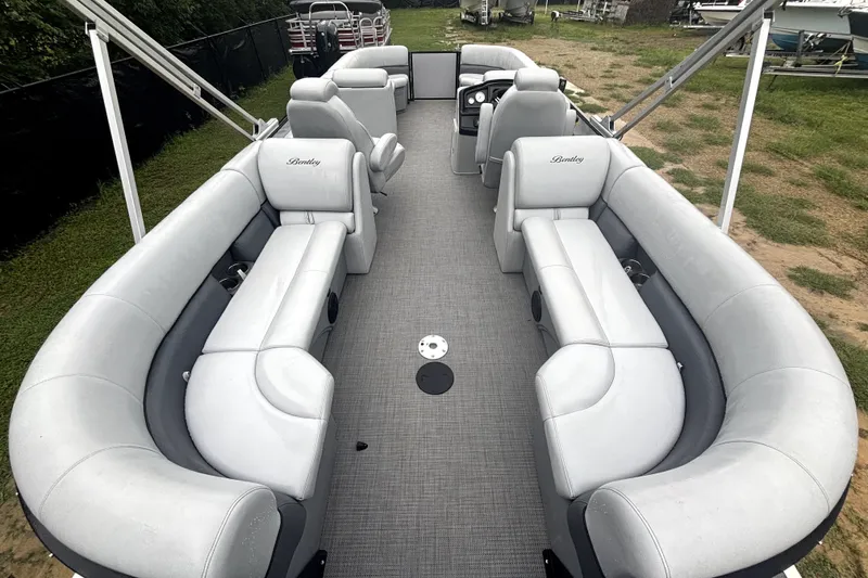 Slide: The Image of 2021 Bentley Pontoons 243 Navigator interior with plush seating and modern design. - 4