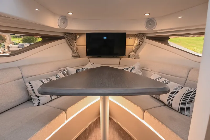 Slide: The Image of Luxurious interior of 2024 Sea Ray Sundancer 320 yacht with elegant seating and modern amenities. - 57