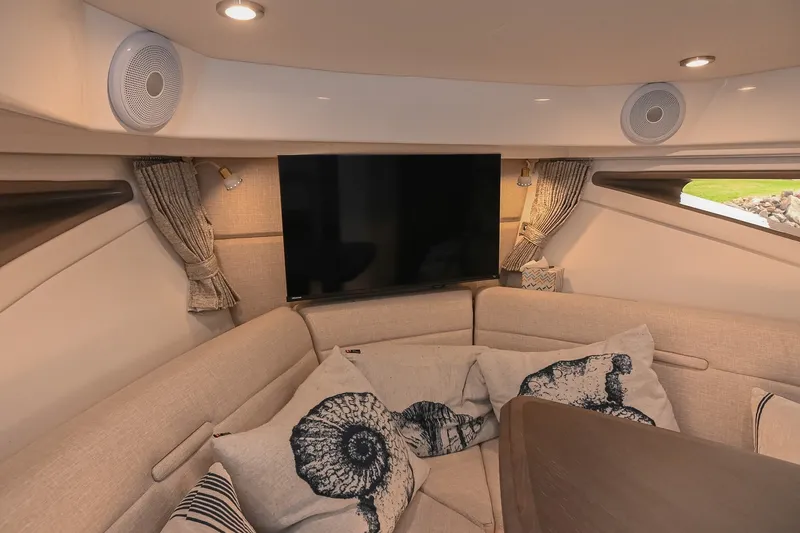 Slide: The Image of Luxurious interior of 2024 Sea Ray Sundancer 320 yacht with cozy seating and modern amenities. - 60