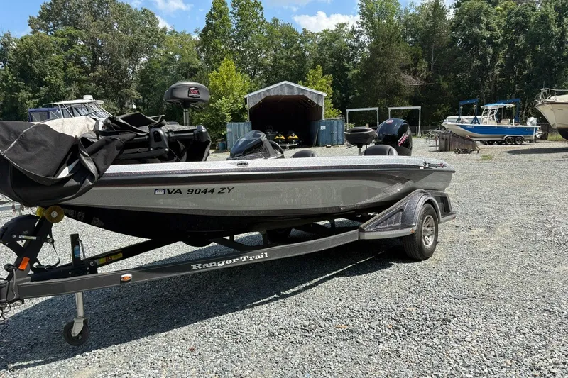 Slide: The Image of 2022 Ranger Z518 boat on trailer in outdoor storage area. - 3