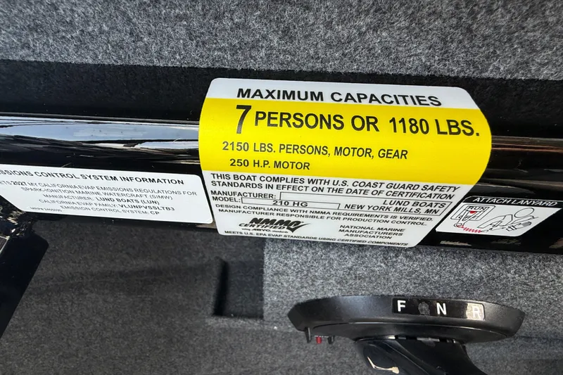 Slide: The Image of 2026 Lund 210 Heavy Gauge boat capacity label, 7 persons or 1180 lbs, 250 HP motor. - 16
