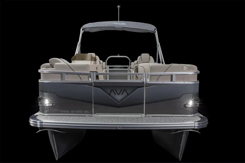 Slide: The Image of Manufacturer Provided Image: 2025 Avalon VENTURE QUAD LOUNGER pontoon boat, rear view, sleek design, illuminated lights. - 6