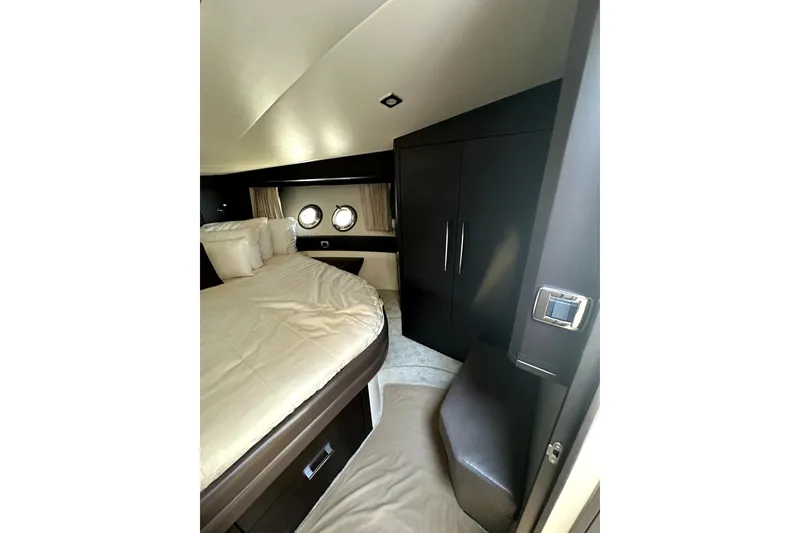 Slide: The Image of Luxurious cabin interior of 2014 Marquis 420 Sport Bridge yacht. - 37