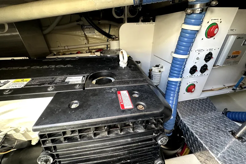 Slide: The Image of Engine room of 2014 Marquis 420 Sport Bridge with control panel and wiring. - 49