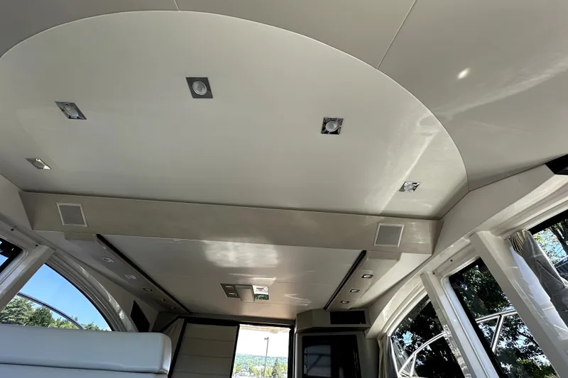 Slide: The Image of Interior ceiling view of 2014 Marquis 420 Sport Bridge yacht with modern lighting. - 34