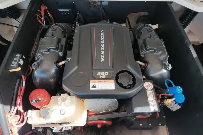 Slide: The Image of 2022 Regal LS2 engine compartment featuring a Volvo Penta 280 V6 engine. - 18