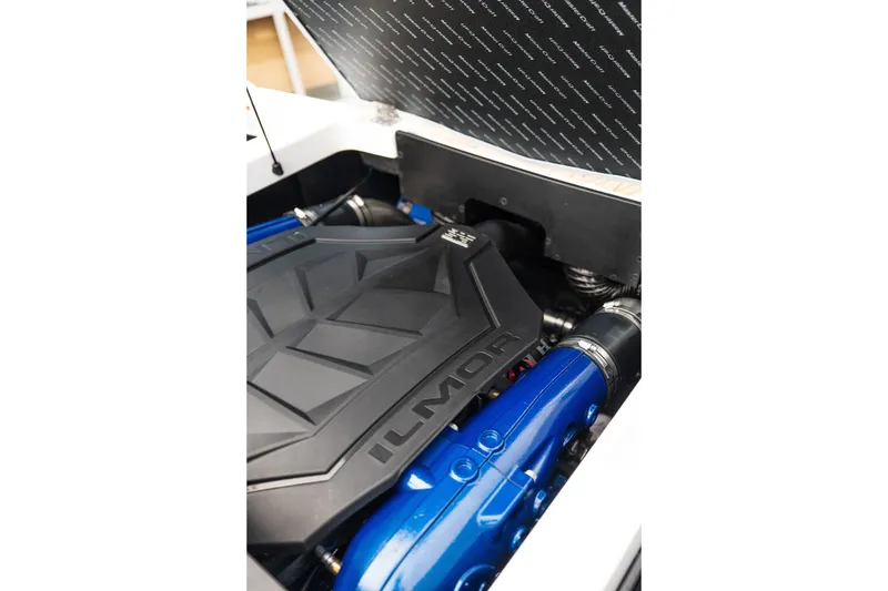 Slide: The Image of Engine compartment of 2027 MasterCraft NXT20 boat featuring Ilmor components. - 29