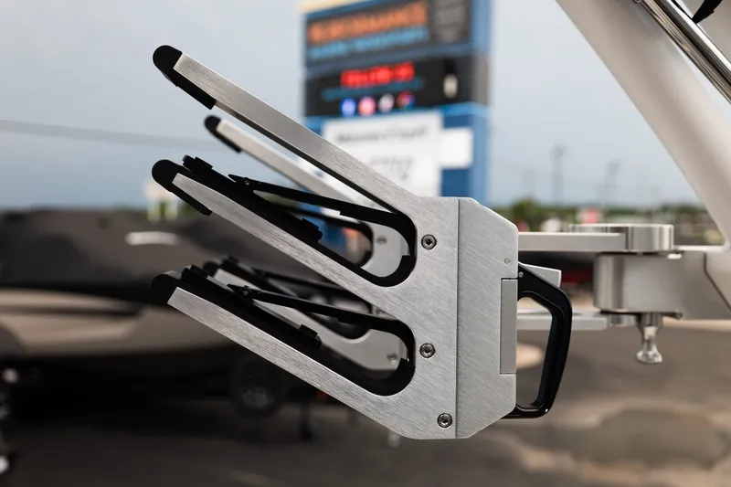Slide: The Image of Close-up of a 2027 MasterCraft NXT20 boat's sleek metal wakeboard rack. - 27