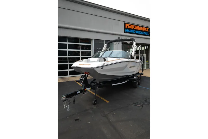 Slide: The Image of 2027 MasterCraft NXT20 boat on trailer at Performance Marine Watersports. - 15