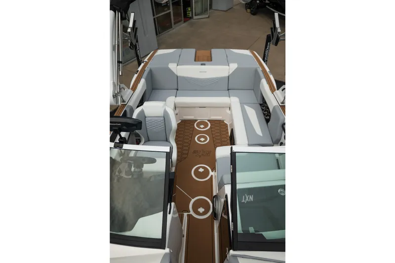 Slide: The Image of 2027 MasterCraft NXT20 boat interior with sleek seating and modern design. - 41
