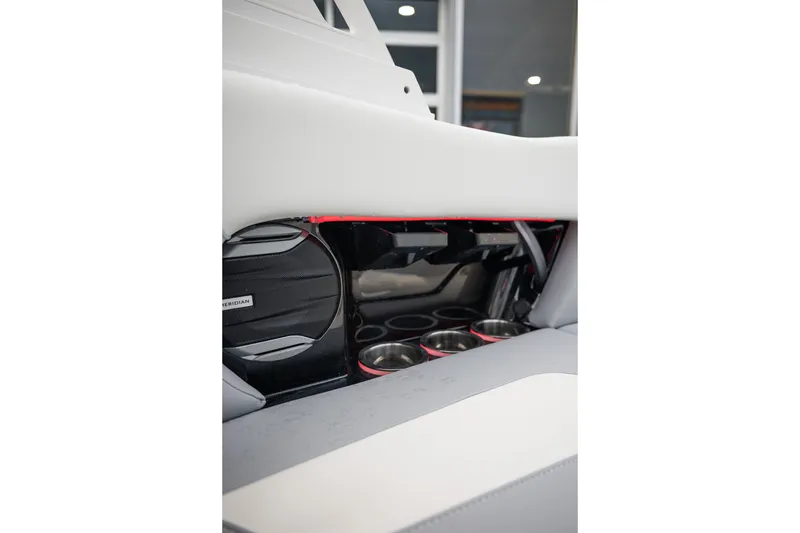 Slide: The Image of Interior of 2027 MasterCraft NXT20 boat featuring cup holders and speaker system. - 30