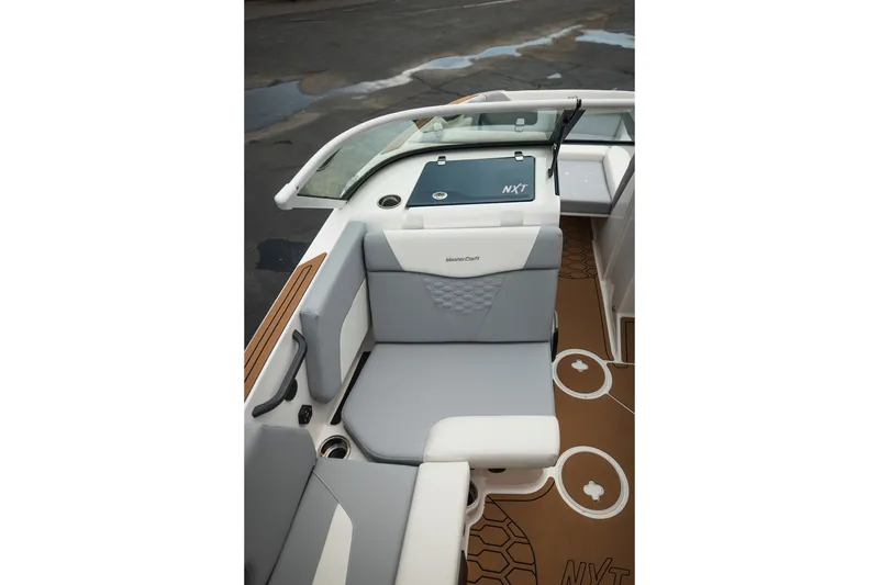 Slide: The Image of Interior view of 2027 MasterCraft NXT20 boat with stylish seating and modern design. - 32