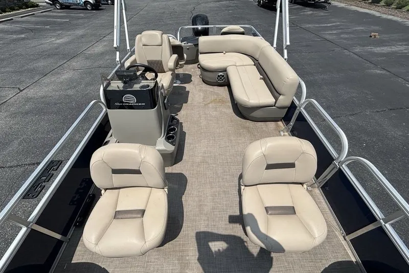 Slide: The Image of 2024 Sun Tracker Bass Buggy 18 DLX pontoon boat with spacious seating and modern design. - 21