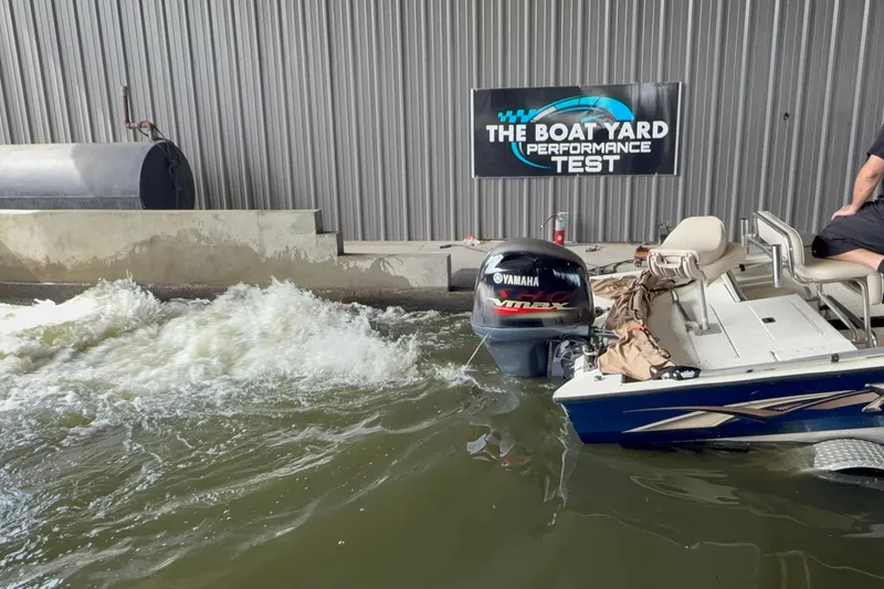 Slide: The Image of 2018 Express 20 boat undergoing performance test with Yamaha engine in water facility. - 22