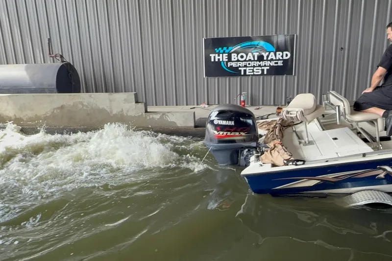 Slide: The Image of 2018 Express 20 boat undergoing performance test in water facility. - 21