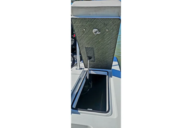 Slide: The Image of Open storage compartment on 2022 East Cape Vantage VHP boat, showcasing interior details. - 23