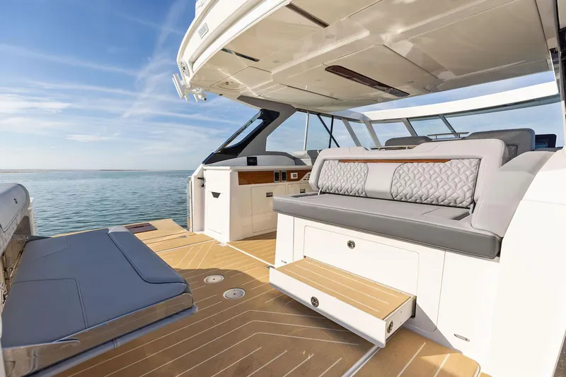 Slide: The Image of Manufacturer Provided Image: Luxurious 2026 Regal LX43 yacht interior with elegant seating and ocean view. - 13