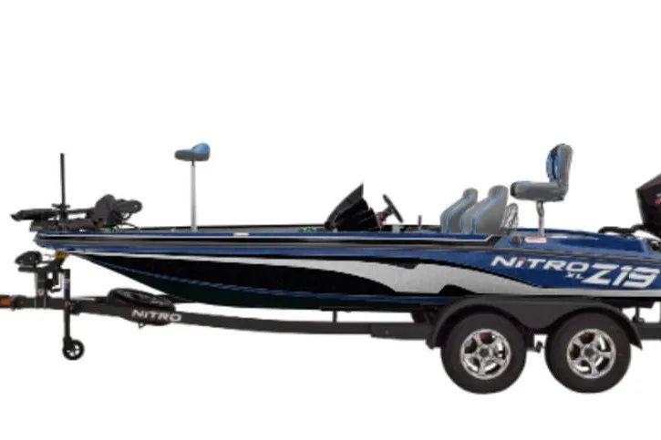 Slide: The Image of 2027 Nitro Z18 Pro fishing boat on trailer, sleek design, blue and black color scheme. - 3