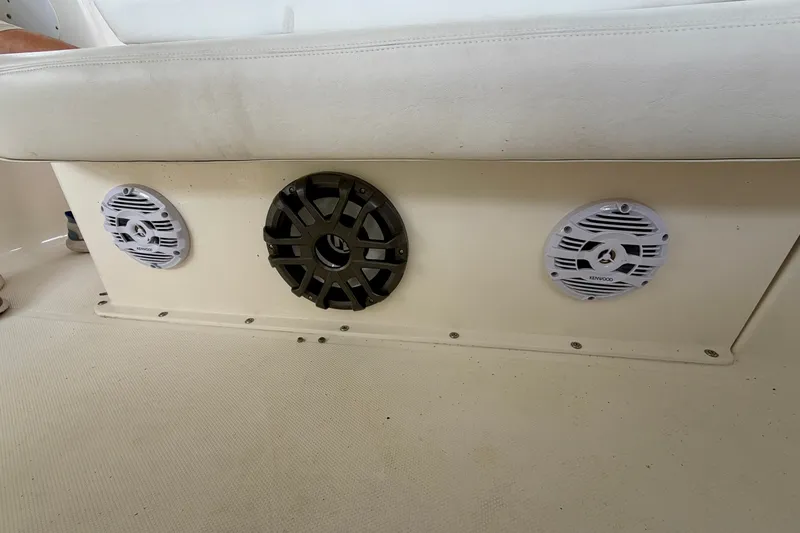 Slide: The Image of Speakers installed on a 2002 Silverton 330 Sport Bridge boat interior. - 21