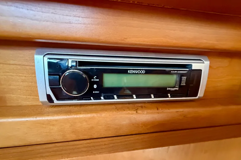 Slide: The Image of Kenwood stereo system in 2002 Silverton 330 Sport Bridge boat interior. - 25