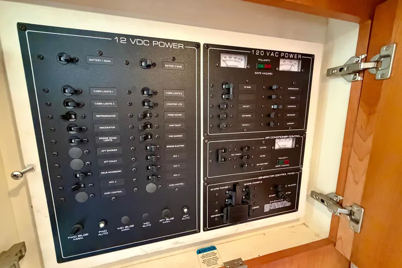 Slide: The Image of Electrical control panel on a 2002 Silverton 330 Sport Bridge boat. - 35