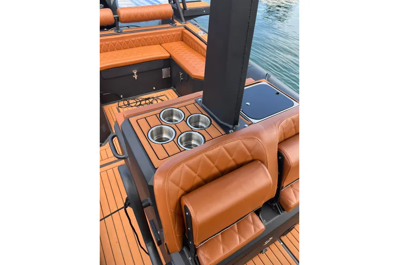 Slide: The Image of Luxurious interior of 2026 Patrol 760 RIB boat with leather seating and cup holders. - 14