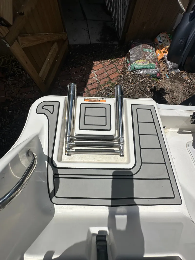 Slide: The Image of A swim platform with a retractable ladder on a boat. - 41