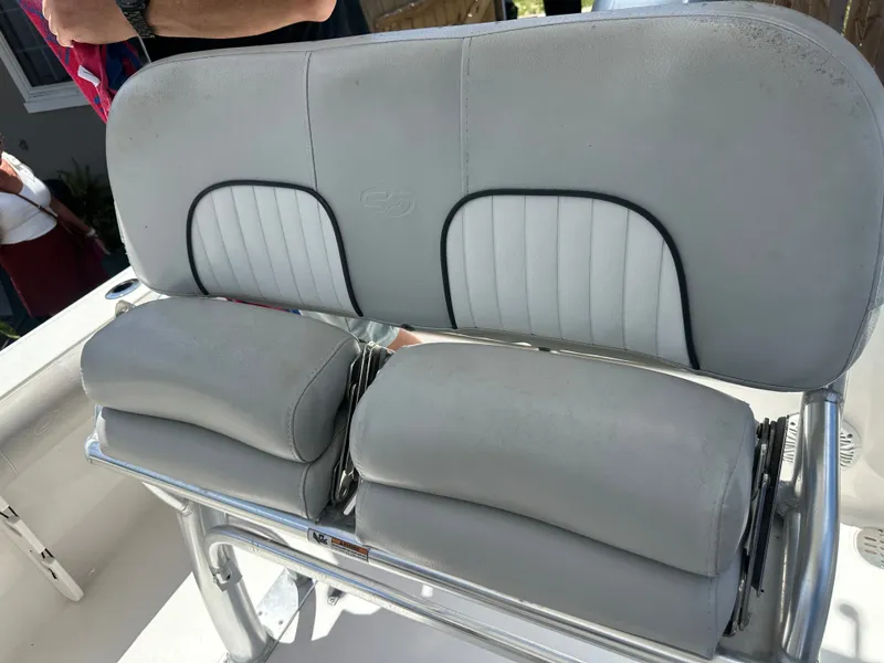 Slide: The Image of Gray upholstery on a boat seat with a stainless steel frame, suitable for comfortable seating. - 49