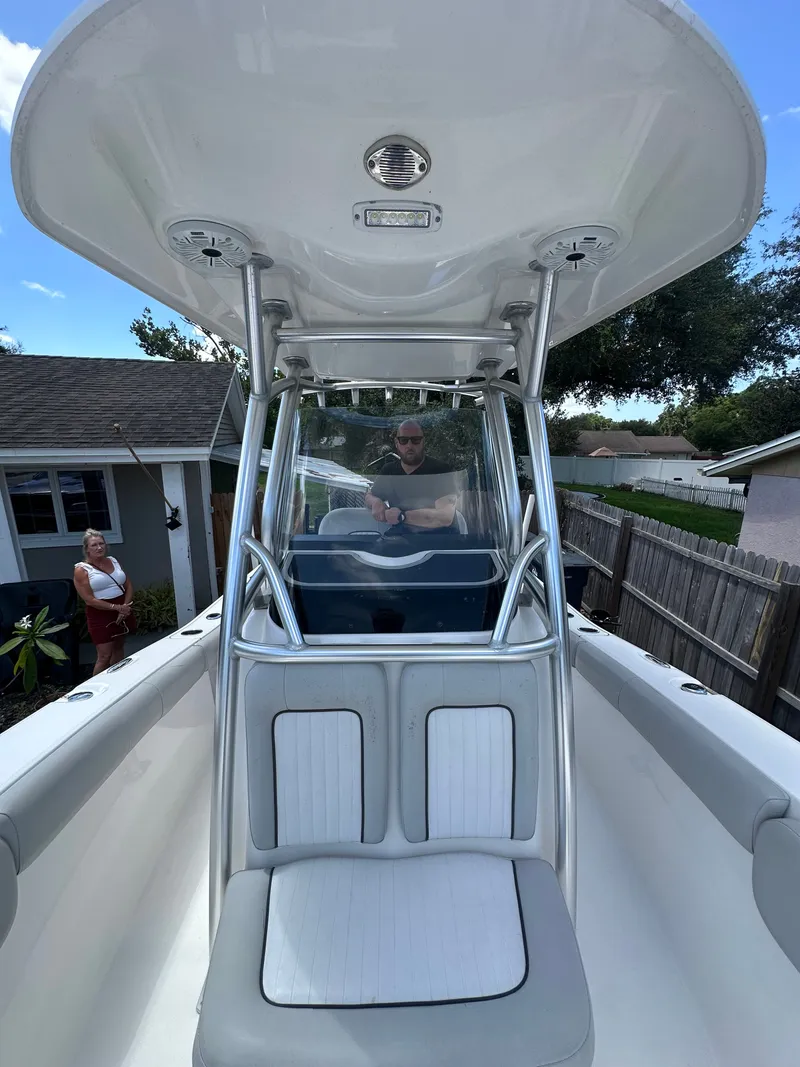 Slide: The Image of A 2020 Sea Fox 228 Commander with a spacious cockpit and a T-top. - 46