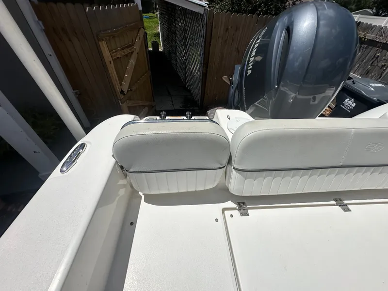 Slide: The Image of The image shows the stern of a Sea Fox 228 Commander boat with a Yamaha outboard motor. - 38