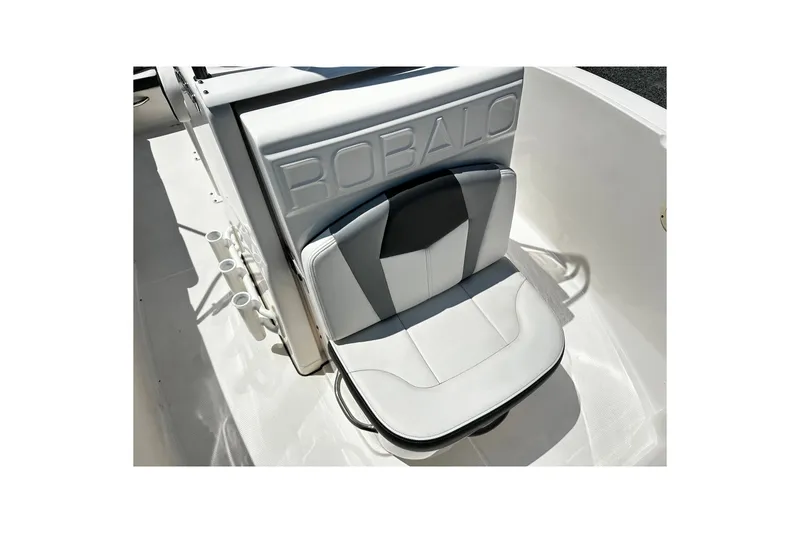 Slide: The Image of 2024 Robalo R180 Center Console boat seat with sleek design and integrated rod holders. - 7