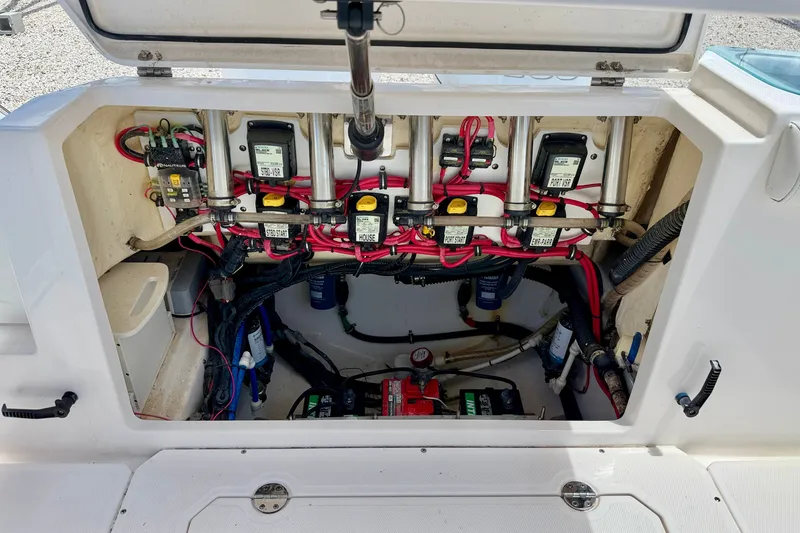 Slide: The Image of 2014 Everglades 255 Center Console boat electrical system with wiring and components. - 36