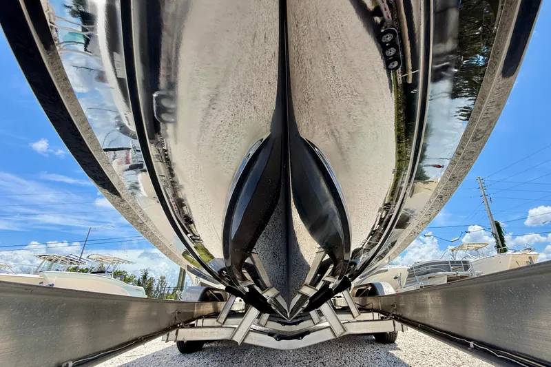 Slide: The Image of Underside view of a 2014 Everglades 255 Center Console boat on a trailer. - 37