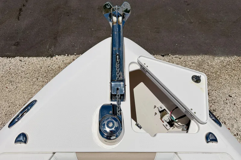 Slide: The Image of Bow view of 2014 Everglades 255 Center Console with anchor and storage compartment. - 34