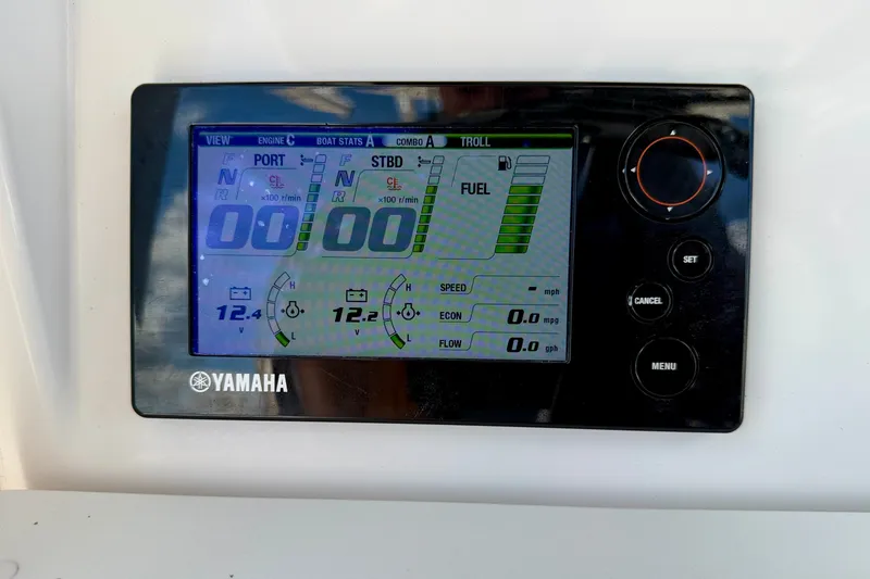 Slide: The Image of Yamaha display panel on 2014 Everglades 255 Center Console boat showing engine and fuel stats. - 19