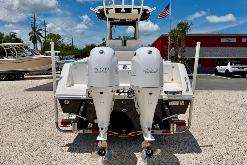 Slide: The Image of 2014 Everglades 255 Center Console boat with twin Yamaha 200 four-stroke engines. - 6