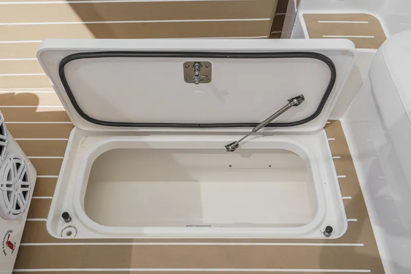 Slide: The Image of Open storage compartment on 2027 Tiara Yachts 39 LE deck. - 81