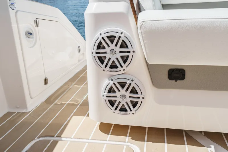 Slide: The Image of 2027 Tiara Yachts 39 LE boat speakers and seating detail on deck. - 35