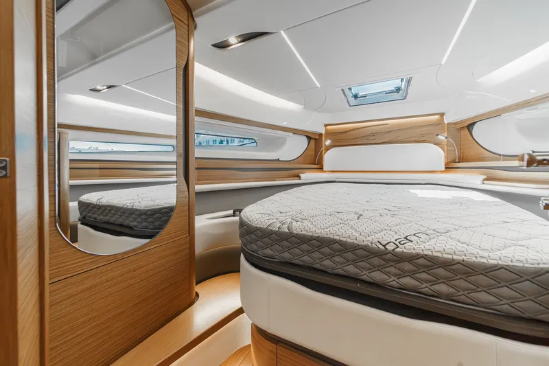 Slide: The Image of Luxurious interior of 2027 Tiara Yachts 39 LE, featuring elegant wood finishes and modern design. - 68