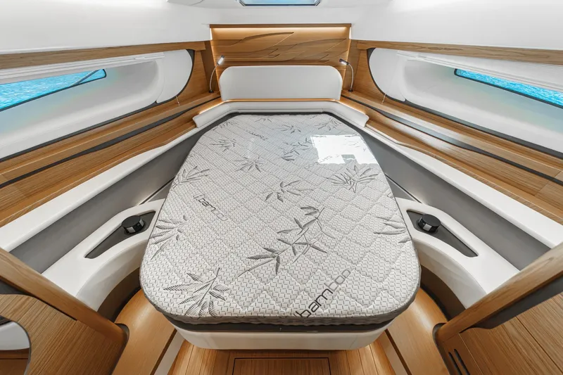 Slide: The Image of Luxurious cabin interior of 2027 Tiara Yachts 39 LE with elegant wood finish. - 66