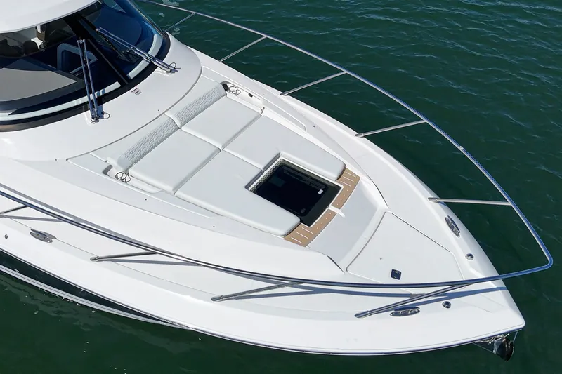 Slide: The Image of 2027 Tiara Yachts 39 LE boat with sleek design on calm water. - 18